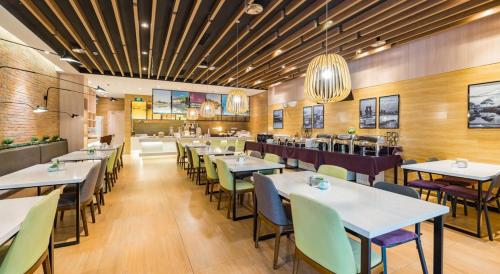 Imagen del bar/restaurante del Hotel Atour Suzhou Wangting. Foto 15