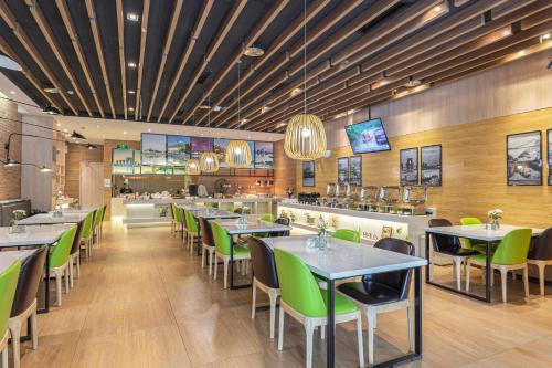 Imagen del bar/restaurante del Hotel Atour Suzhou Wangting. Foto 16