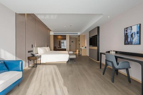Imagen de la habitación del Hotel Atour Suzhou Wujiang Suzhou Bay. Foto 11