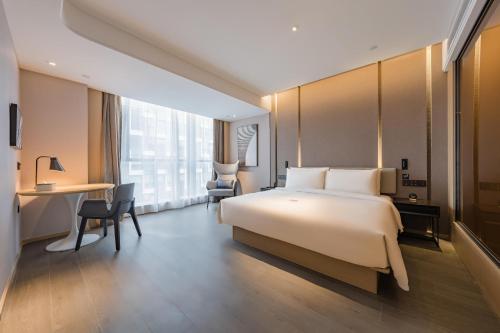Imagen de la habitación del Hotel Atour Suzhou Wujiang Suzhou Bay. Foto 12