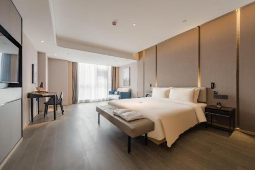 Imagen de la habitación del Hotel Atour Suzhou Wujiang Suzhou Bay. Foto 13