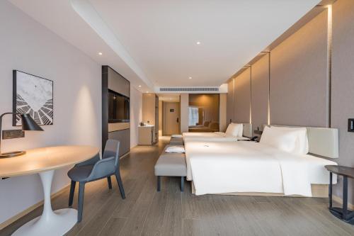 Imagen de la habitación del Hotel Atour Suzhou Wujiang Suzhou Bay. Foto 14