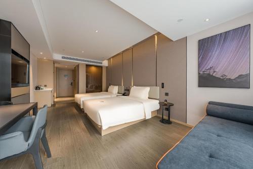 Imagen de la habitación del Hotel Atour Suzhou Wujiang Suzhou Bay. Foto 16