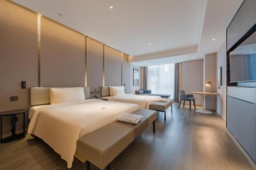 Imagen de la habitación del Hotel Atour Suzhou Wujiang Suzhou Bay. Foto 18