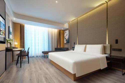Imagen de la habitación del Hotel Atour Suzhou Wuzhong Taihu New Town. Foto 14