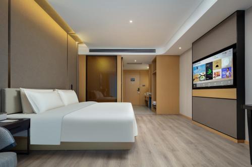 Imagen de la habitación del Hotel Atour Suzhou Wuzhong Taihu New Town. Foto 16