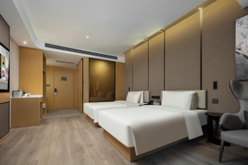 Imagen de la habitación del Hotel Atour Suzhou Wuzhong Taihu New Town. Foto 19
