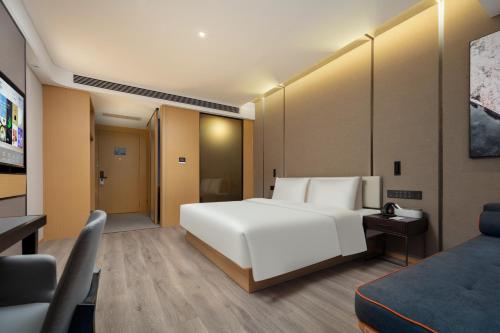 Imagen de la habitación del Hotel Atour Suzhou Wuzhong Taihu New Town. Foto 20
