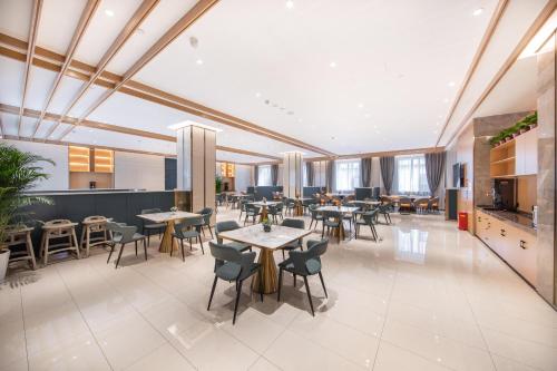 Imagen del bar/restaurante del Hotel Atour Taiyuan Changfeng Business Center Wanxiang City. Foto 8