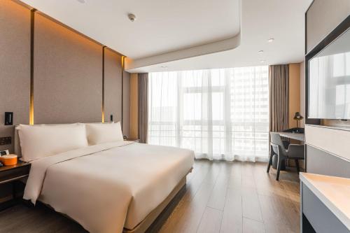 Imagen de la habitación del Hotel Atour Tianjin Binhai High Speed Railway Station. Foto 8
