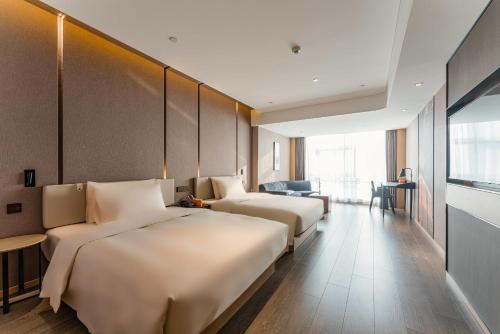 Imagen de la habitación del Hotel Atour Tianjin Binhai High Speed Railway Station. Foto 10