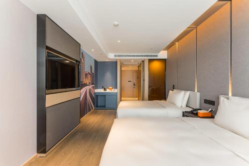 Imagen de la habitación del Hotel Atour Tianjin Binhai High Speed Railway Station. Foto 12