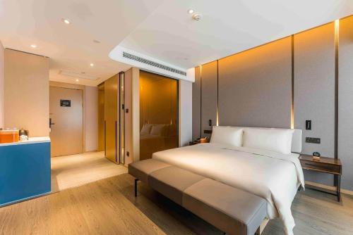 Imagen de la habitación del Hotel Atour Tianjin Binhai High Speed Railway Station. Foto 14