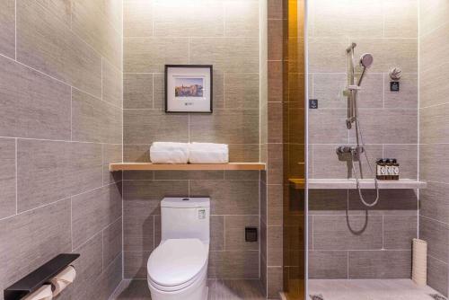 Imagen de la habitación del Hotel Atour Tianjin Binhai High Speed Railway Station. Foto 19