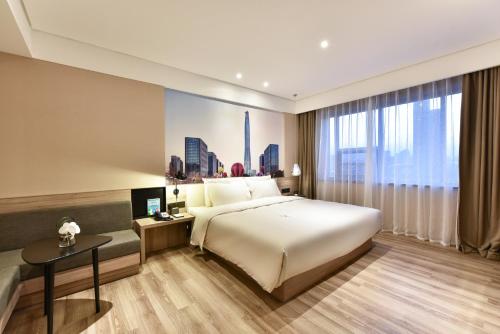 Imagen de la habitación del Hotel Atour (Tianjin Development Zone First Street). Foto 2