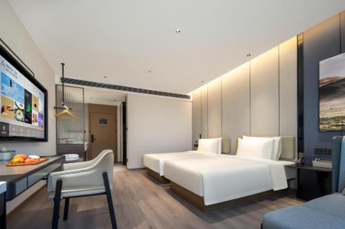 Imagen de la habitación del Hotel Atour Tianjin Zhongbei Haitai Industrial Park. Foto 19
