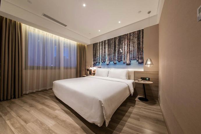 Imagen de la habitación del Hotel Atour Tianyi Square Ningbo. Foto 11