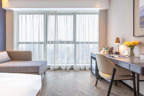 Imagen de la habitación del Hotel Atour Wuhan Chuhe Han Street Hongshan Plaza. Foto 8