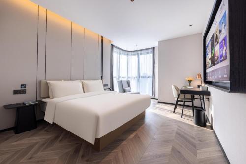 Imagen de la habitación del Hotel Atour Wuhan Chuhe Han Street Hongshan Plaza. Foto 9