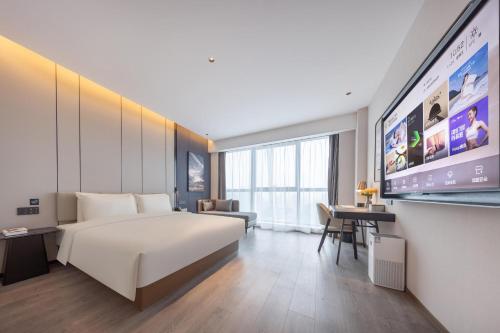 Imagen de la habitación del Hotel Atour Wuhan Chuhe Han Street Hongshan Plaza. Foto 10