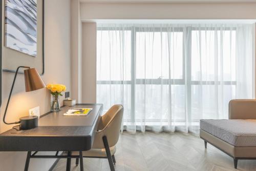 Imagen de la habitación del Hotel Atour Wuhan Chuhe Han Street Hongshan Plaza. Foto 13