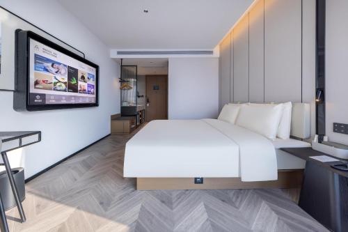 Imagen de la habitación del Hotel Atour Wuhan Chuhe Han Street Hongshan Plaza. Foto 14