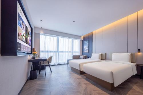 Imagen de la habitación del Hotel Atour Wuhan Chuhe Han Street Hongshan Plaza. Foto 17