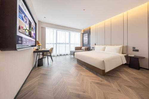 Imagen de la habitación del Hotel Atour Wuhan Chuhe Han Street Hongshan Plaza. Foto 19