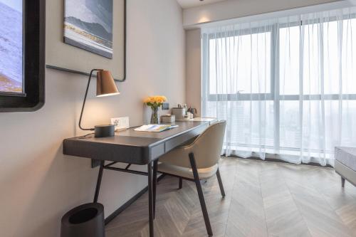 Imagen de la habitación del Hotel Atour Wuhan Chuhe Han Street Hongshan Plaza. Foto 20