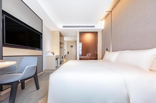 Imagen de la habitación del Hotel Atour Wuhan Chuhehanjie Xiu Theater. Foto 11