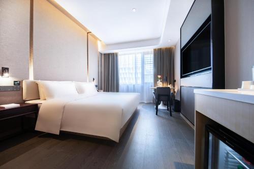 Imagen de la habitación del Hotel Atour Wuhan Chuhehanjie Xiu Theater. Foto 12