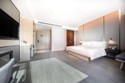 Imagen de la habitación del Hotel Atour Wuhan Chuhehanjie Xiu Theater. Foto 14