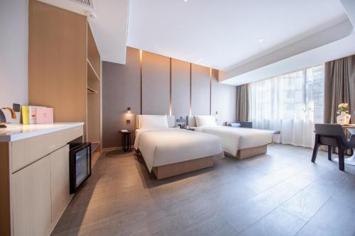 Imagen de la habitación del Hotel Atour Wuhan Chuhehanjie Xiu Theater. Foto 15