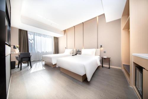 Imagen de la habitación del Hotel Atour Wuhan Chuhehanjie Xiu Theater. Foto 18