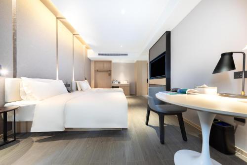 Imagen de la habitación del Hotel Atour Wuhan Chuhehanjie Xiu Theater. Foto 19