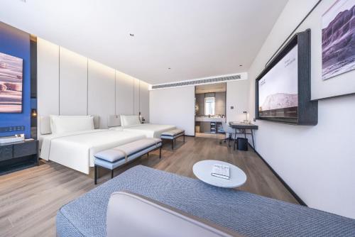 Imagen de la habitación del Hotel Atour Wuhan Optics Valley Plaza Nationalities University. Foto 16