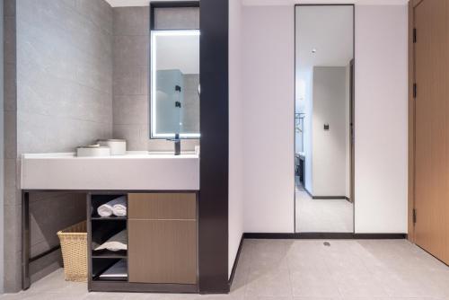 Imagen de la habitación del Hotel Atour Wuhan Optics Valley Plaza Nationalities University. Foto 17