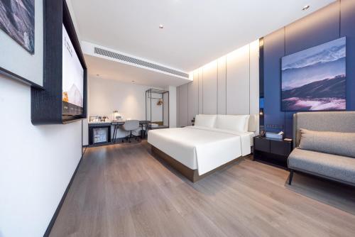 Imagen de la habitación del Hotel Atour Wuhan Optics Valley Plaza Nationalities University. Foto 19