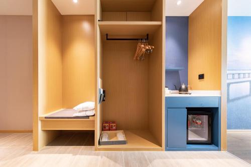 Imagen de la habitación del Hotel Atour Wuhan Tiandi Hankou Jiangtan. Foto 16