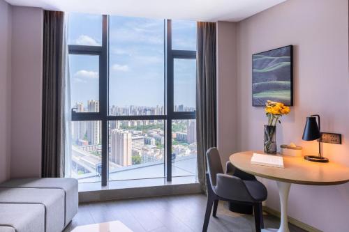 Imagen de la habitación del Hotel Atour Wuhan University of Technology Jiedaokou. Foto 16