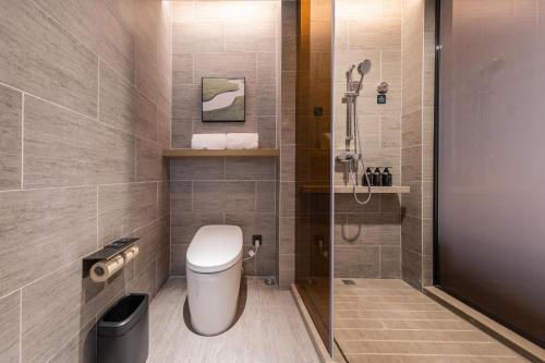 Imagen de la habitación del Hotel Atour Wuhan University of Technology Jiedaokou. Foto 17