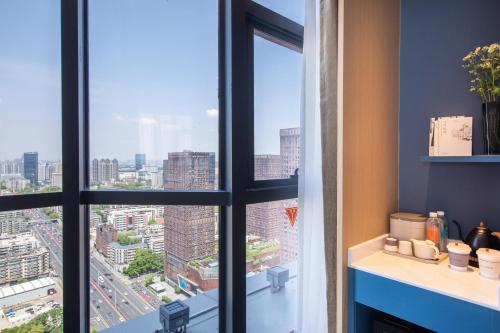 Imagen de la habitación del Hotel Atour Wuhan University of Technology Jiedaokou. Foto 18