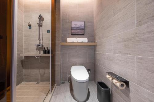 Imagen de la habitación del Hotel Atour Wuhan University of Technology Jiedaokou. Foto 19