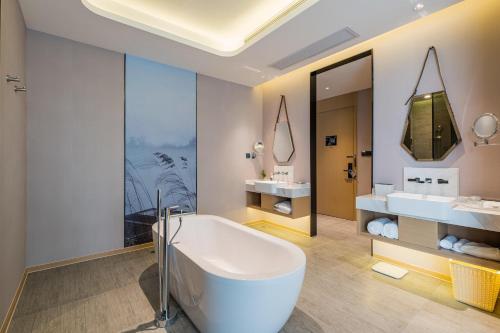 Imagen de la habitación del Hotel Atour Wuxi Coast City. Foto 13