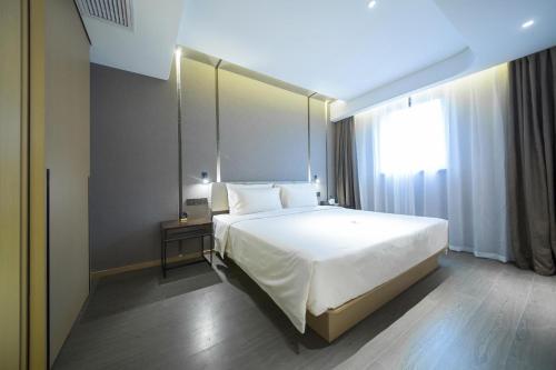 Imagen de la habitación del Hotel Atour Wuxi Railway Station Chunsheng Road. Foto 14