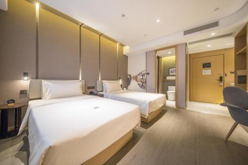Imagen de la habitación del Hotel Atour Wuxi Railway Station Chunsheng Road. Foto 15