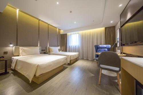 Imagen de la habitación del Hotel Atour Wuxi Railway Station Chunsheng Road. Foto 16