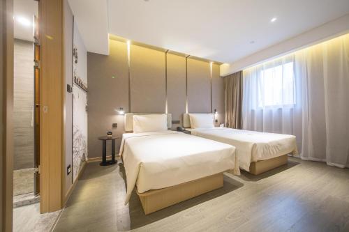 Imagen de la habitación del Hotel Atour Wuxi Railway Station Chunsheng Road. Foto 20
