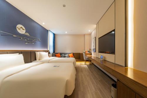 Imagen de la habitación del Hotel Atour X Beijing Sanyuan Bridge. Foto 13