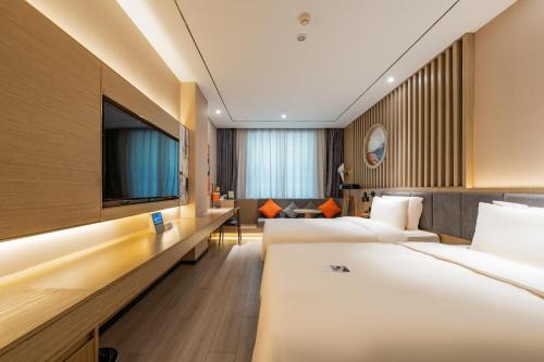 Imagen de la habitación del Hotel Atour X Beijing Sanyuan Bridge. Foto 15